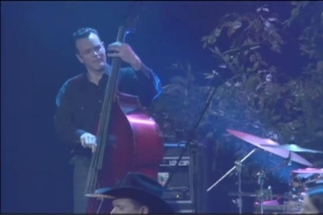 kevin smith from high noon plays upright bass with willie nelson in hesitation blues