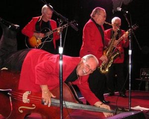 rockabilly slap bassist marshall lytle on the floor with bill haley's original comets