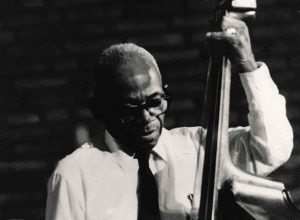 Chester Zardis, little bear, slaps his upright bass